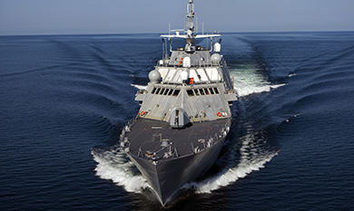 Image of the USS Cleveland cruising