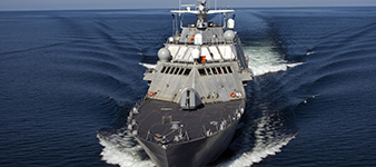 Image of the USS Cleveland cruising